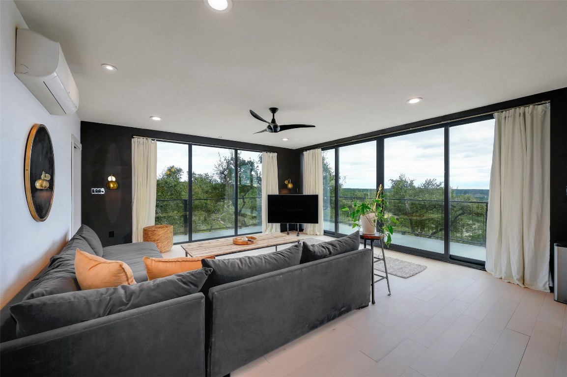 640 Ghost Dancer Fischer, TX 78623 - Photo 17 of 40 a living room with furniture and a large window