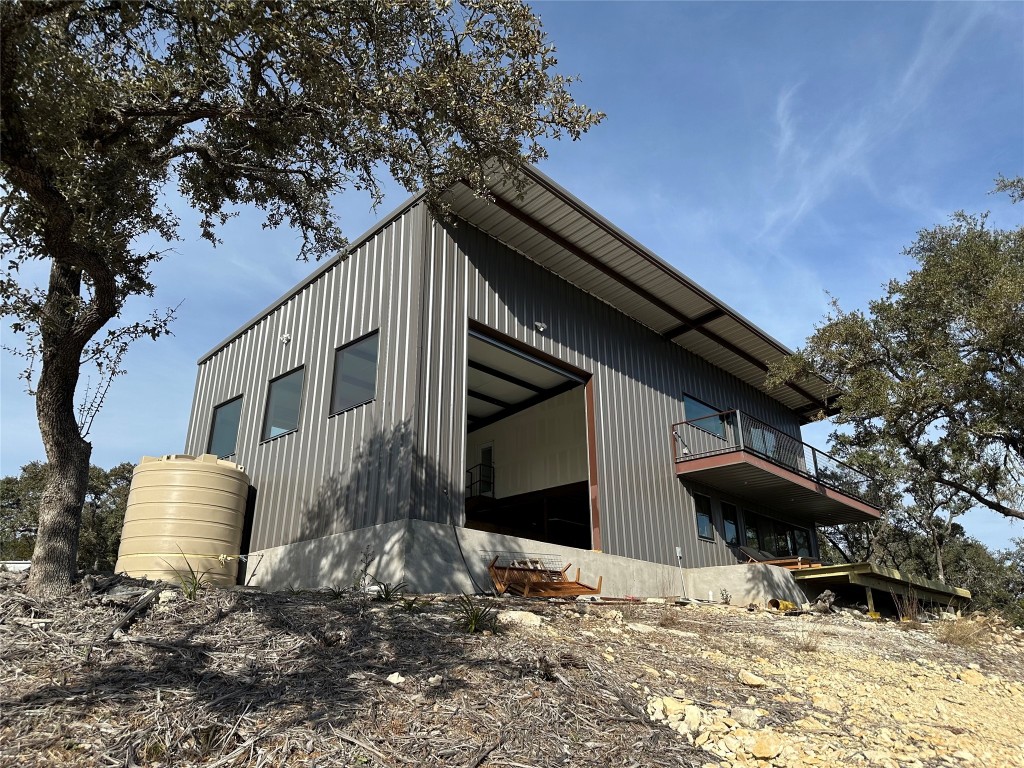640 Ghost Dancer Fischer, TX 78623 - Photo 30 of 40 a backyard of a house with table and chairs