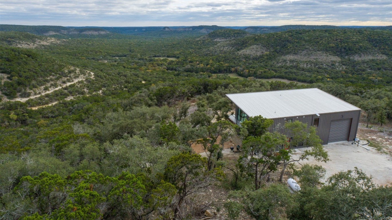 640 Ghost Dancer Fischer, TX 78623 - Photo 33 of 40 a view of a big yard with lots of green space and mountain view