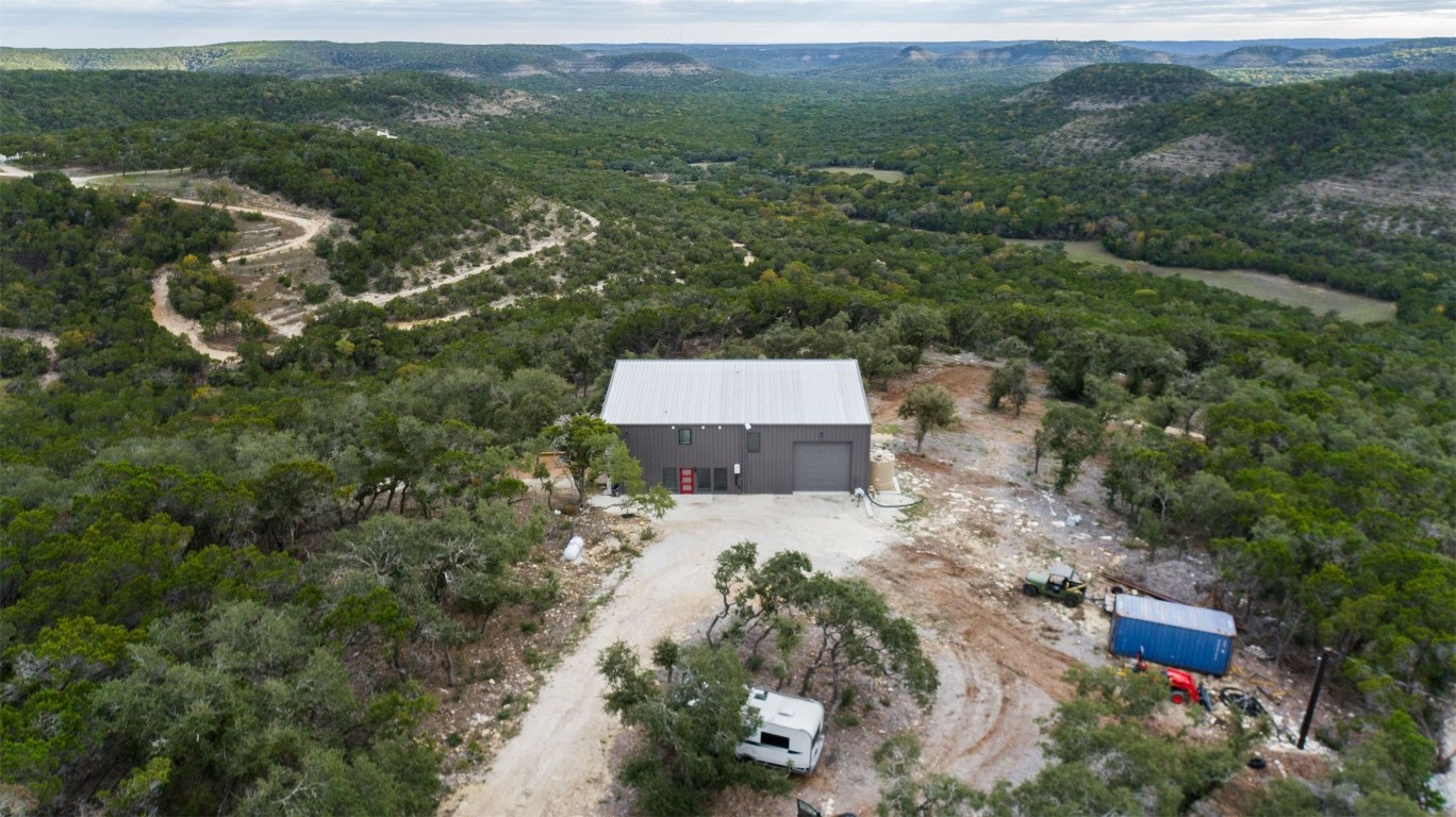 640 Ghost Dancer Fischer, TX 78623 - Photo 35 of 40 an aerial view of a house with a yard