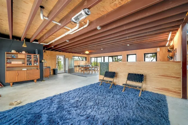 a view of a chairs in an empty room