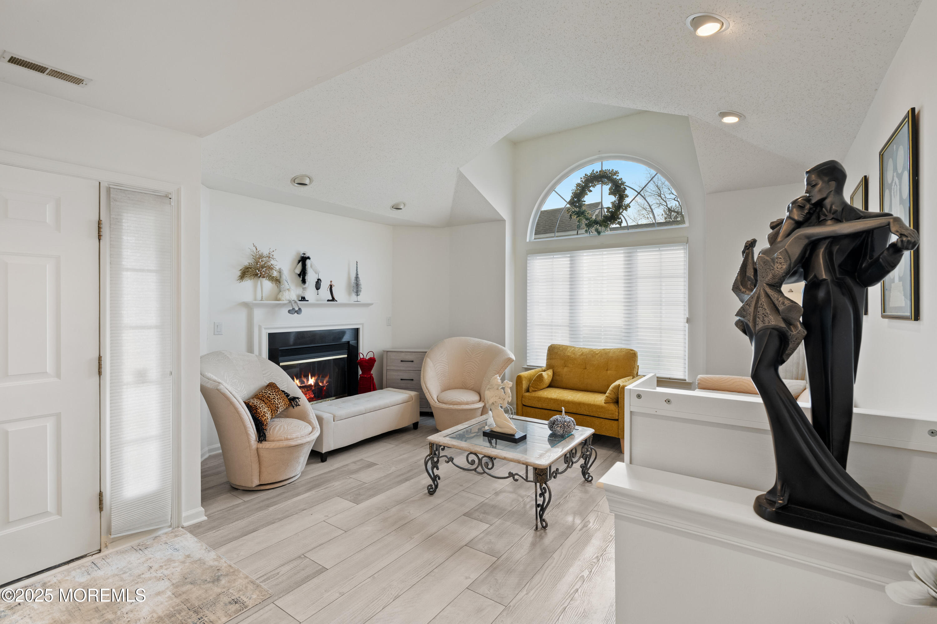 7 Regent Square Jackson, NJ 08527 - Photo 5 of 29 a living room with furniture a window and a potted plant