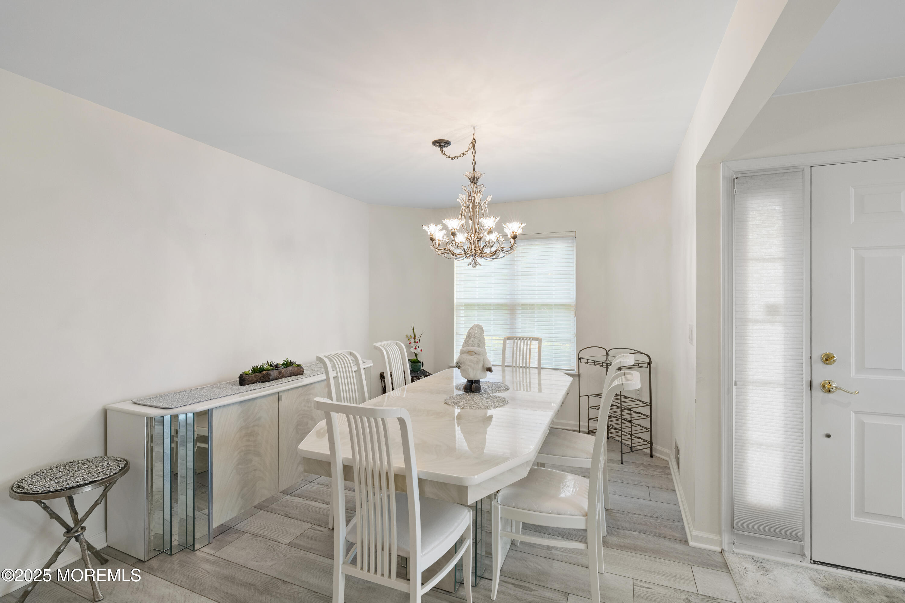 7 Regent Square Jackson, NJ 08527 - Photo 7 of 29 a view of a dining room with furniture and chandelier