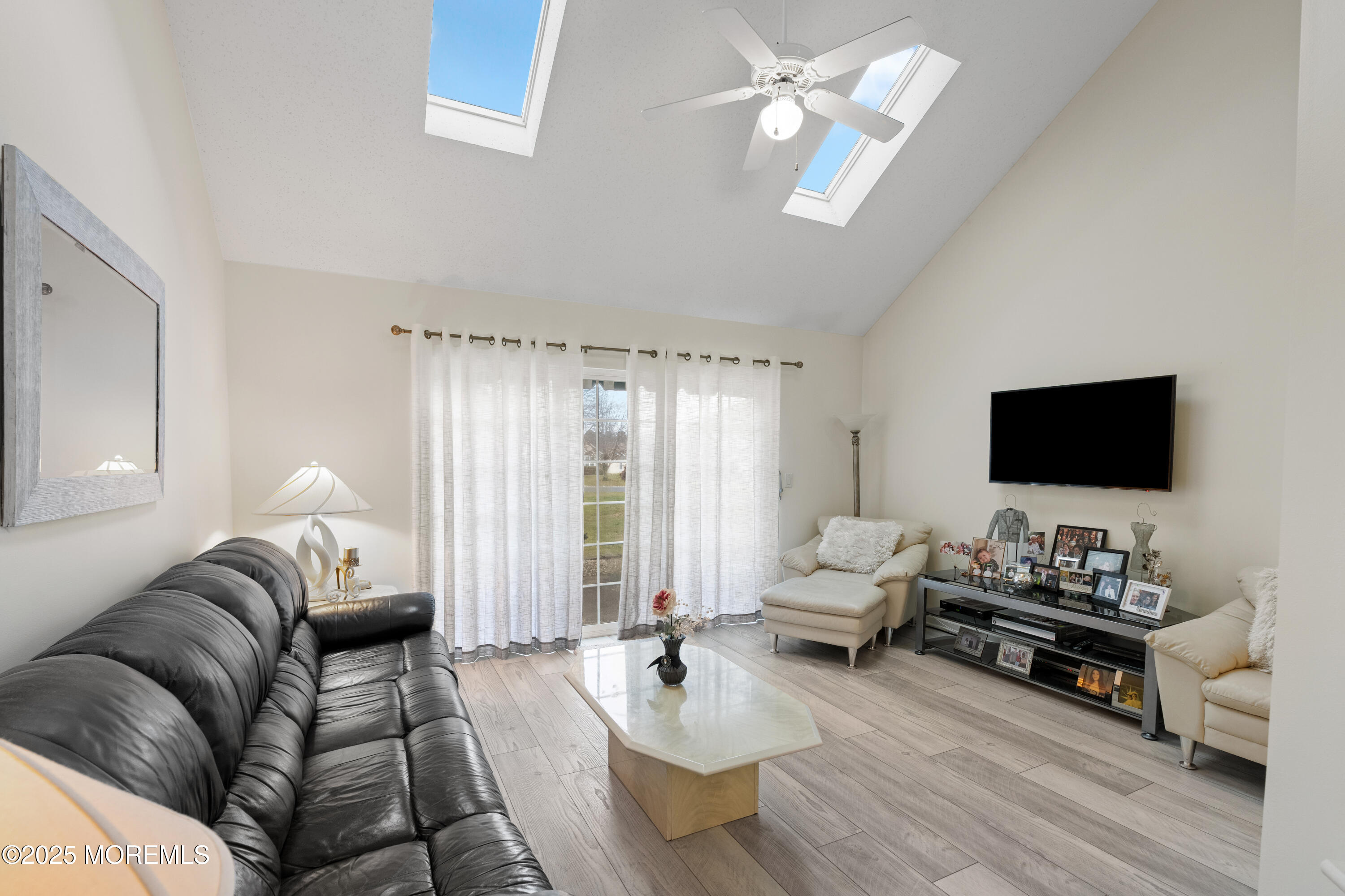 7 Regent Square Jackson, NJ 08527 - Photo 10 of 29 a living room with furniture and a flat screen tv
