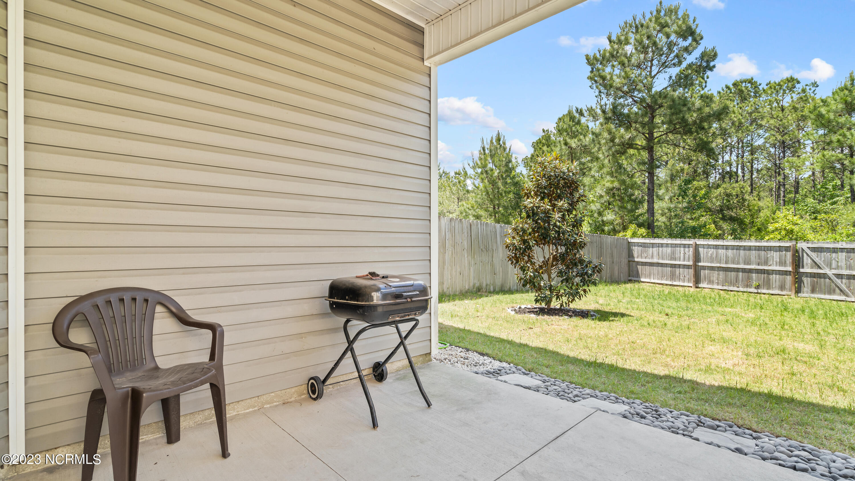 387 Frisco Way Holly Ridge, NC 28445 - Photo 27 of 37 Covered Back Patio