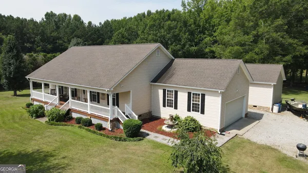 front view of a house with a yard