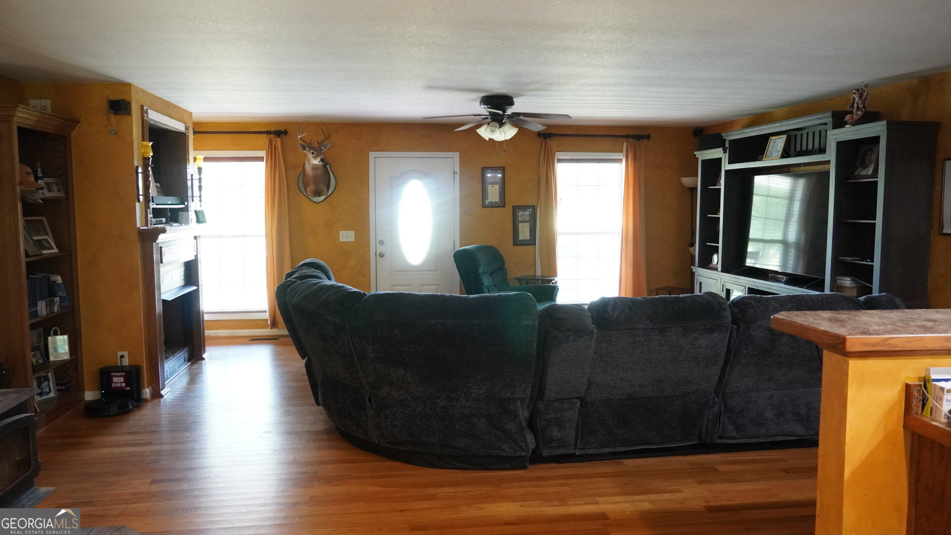 1881 Beeks Road Williamson, GA 30292 - Photo 13 of 32 a living room with furniture and a large window