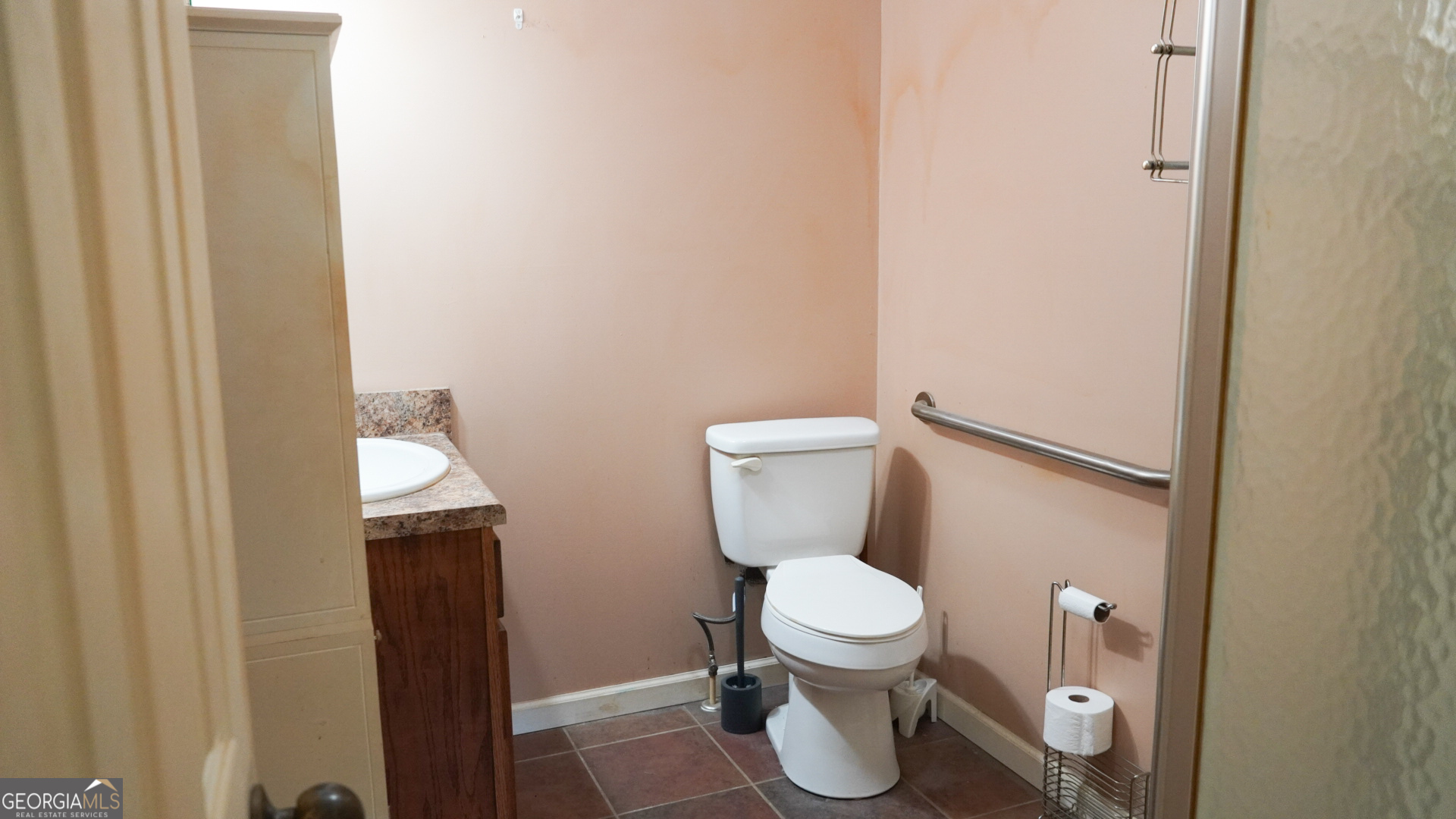 1881 Beeks Road Williamson, GA 30292 - Photo 25 of 32 a white toilet sitting next to a shower