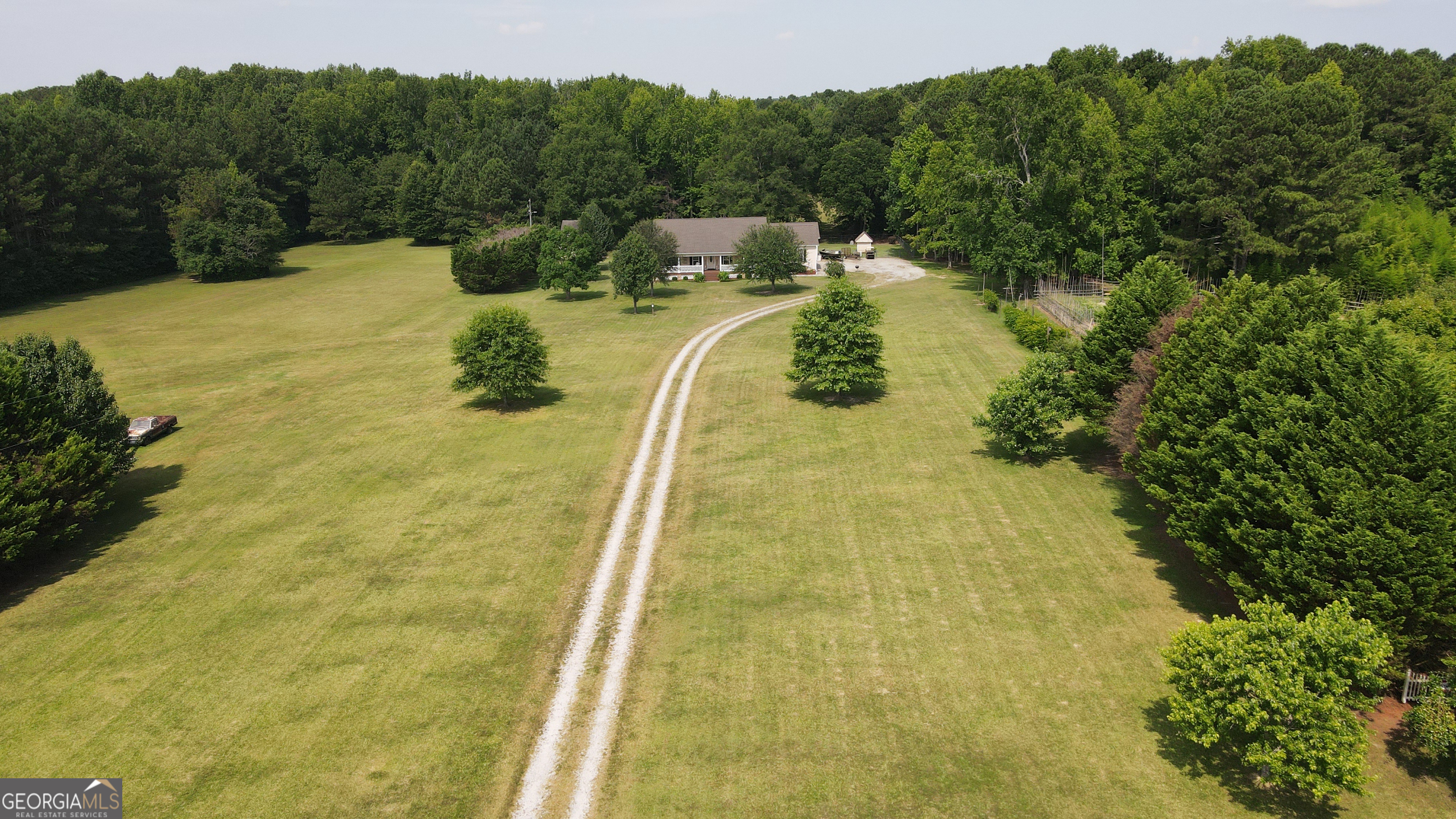 1881 Beeks Road Williamson, GA 30292 - Photo 31 of 32 a view of a swimming pool with a yard