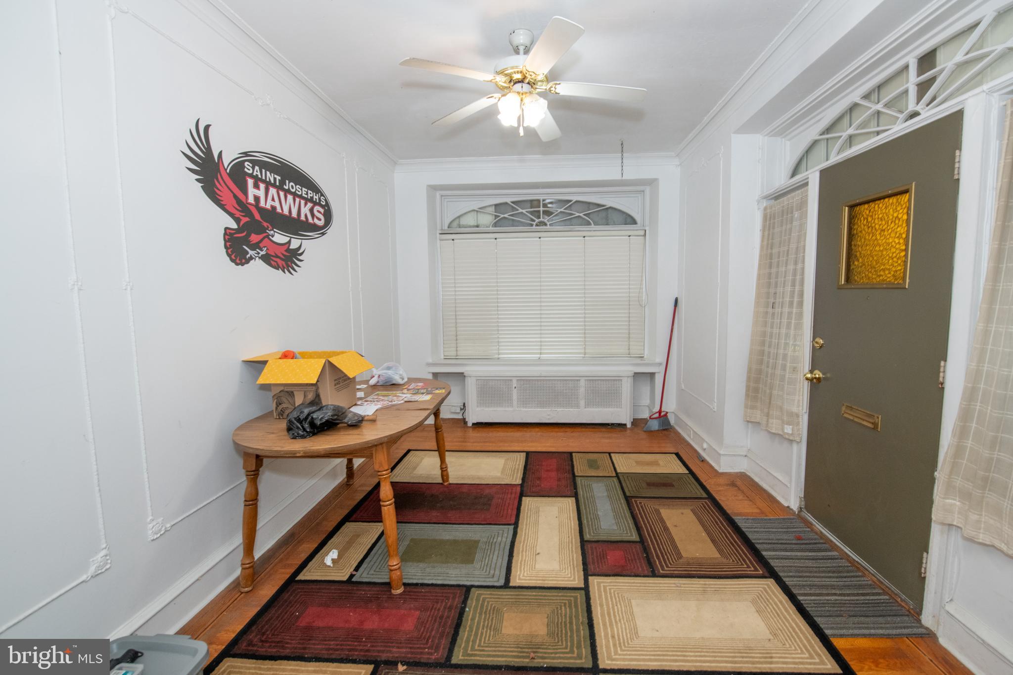 5608 Woodbine Avenue Philadelphia, PA 19131 - Photo 19 of 44 a room with gym equipment and a rug