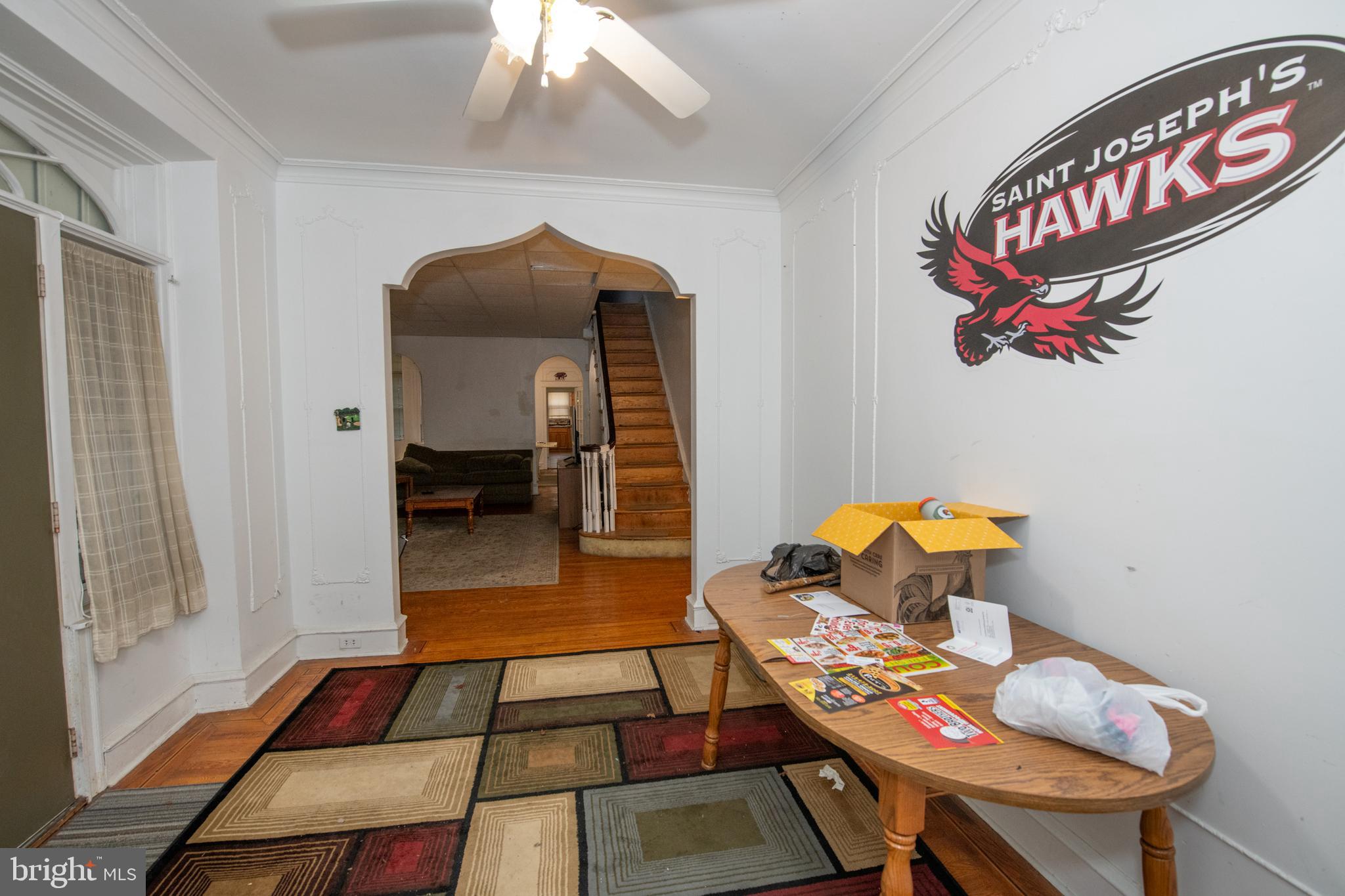 5608 Woodbine Avenue Philadelphia, PA 19131 - Photo 20 of 44 a room with furniture and a rug