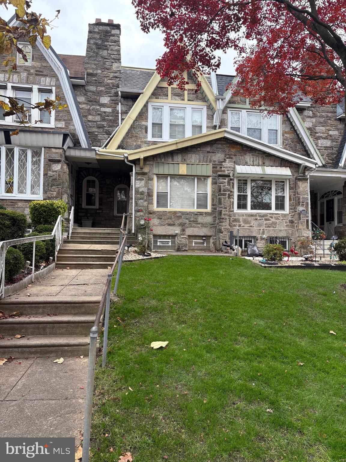 5608 Woodbine Avenue Philadelphia, PA 19131 - Photo 2 of 44 a front view of a house with garden