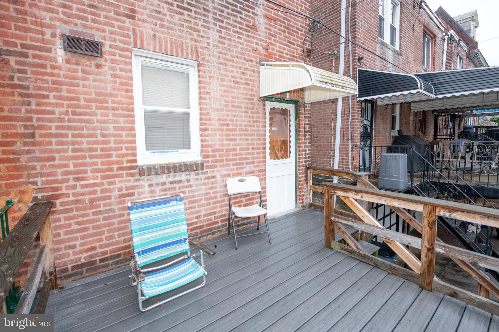 5608 Woodbine Avenue Philadelphia, PA 19131 - Photo 23 of 44 a front view of a house with balcony