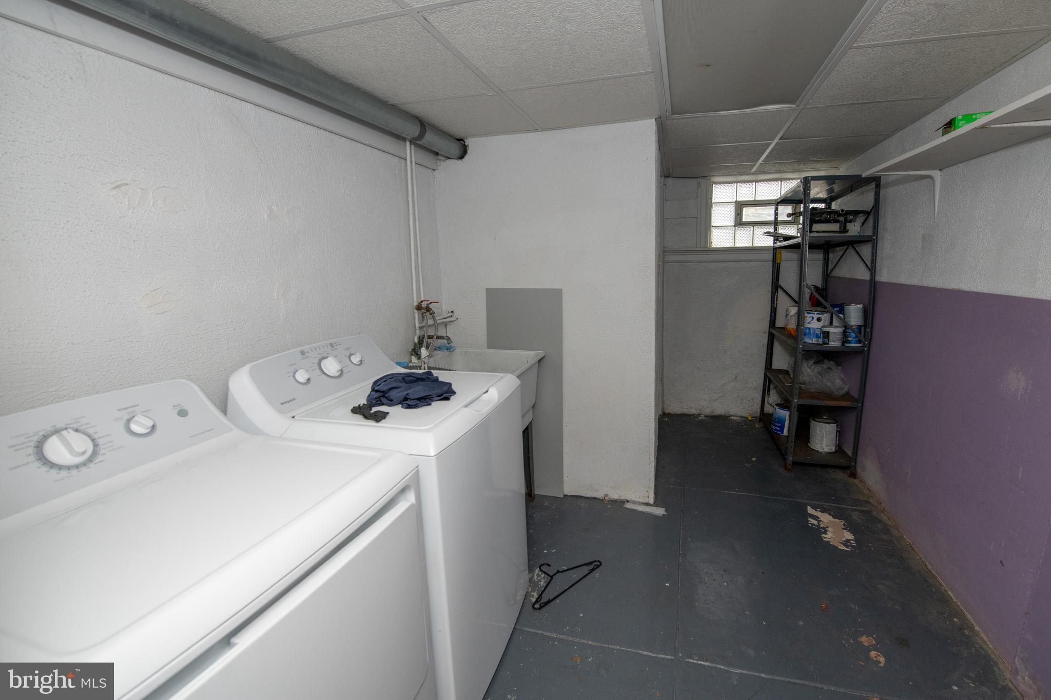 5608 Woodbine Avenue Philadelphia, PA 19131 - Photo 26 of 44 a view of storage and utility room with washer and dryer