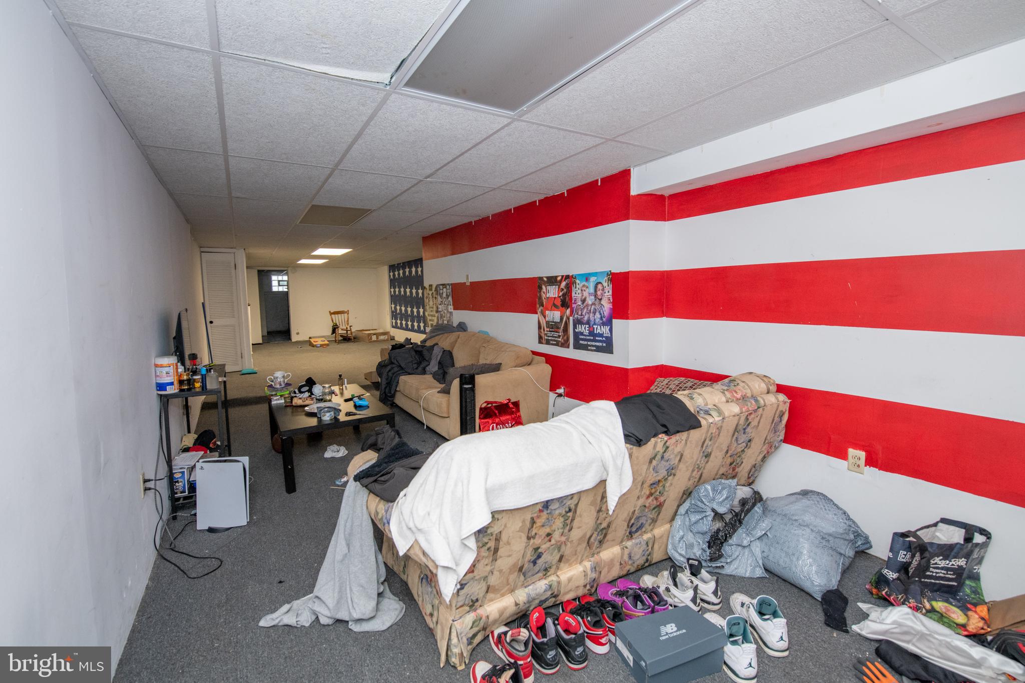 5608 Woodbine Avenue Philadelphia, PA 19131 - Photo 30 of 44 a living room with furniture and a couch