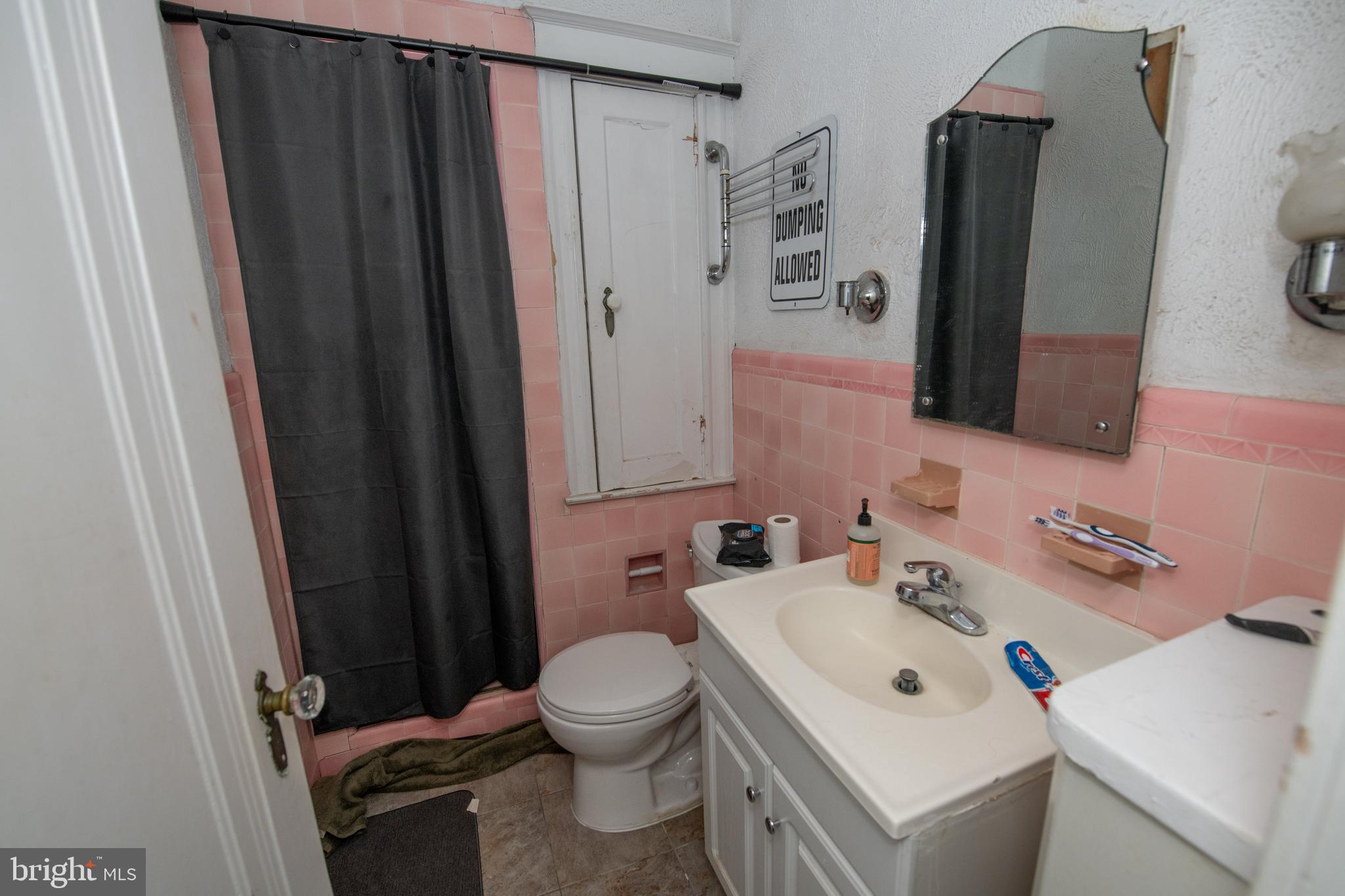 5608 Woodbine Avenue Philadelphia, PA 19131 - Photo 33 of 44 a bathroom with a sink toilet and shower