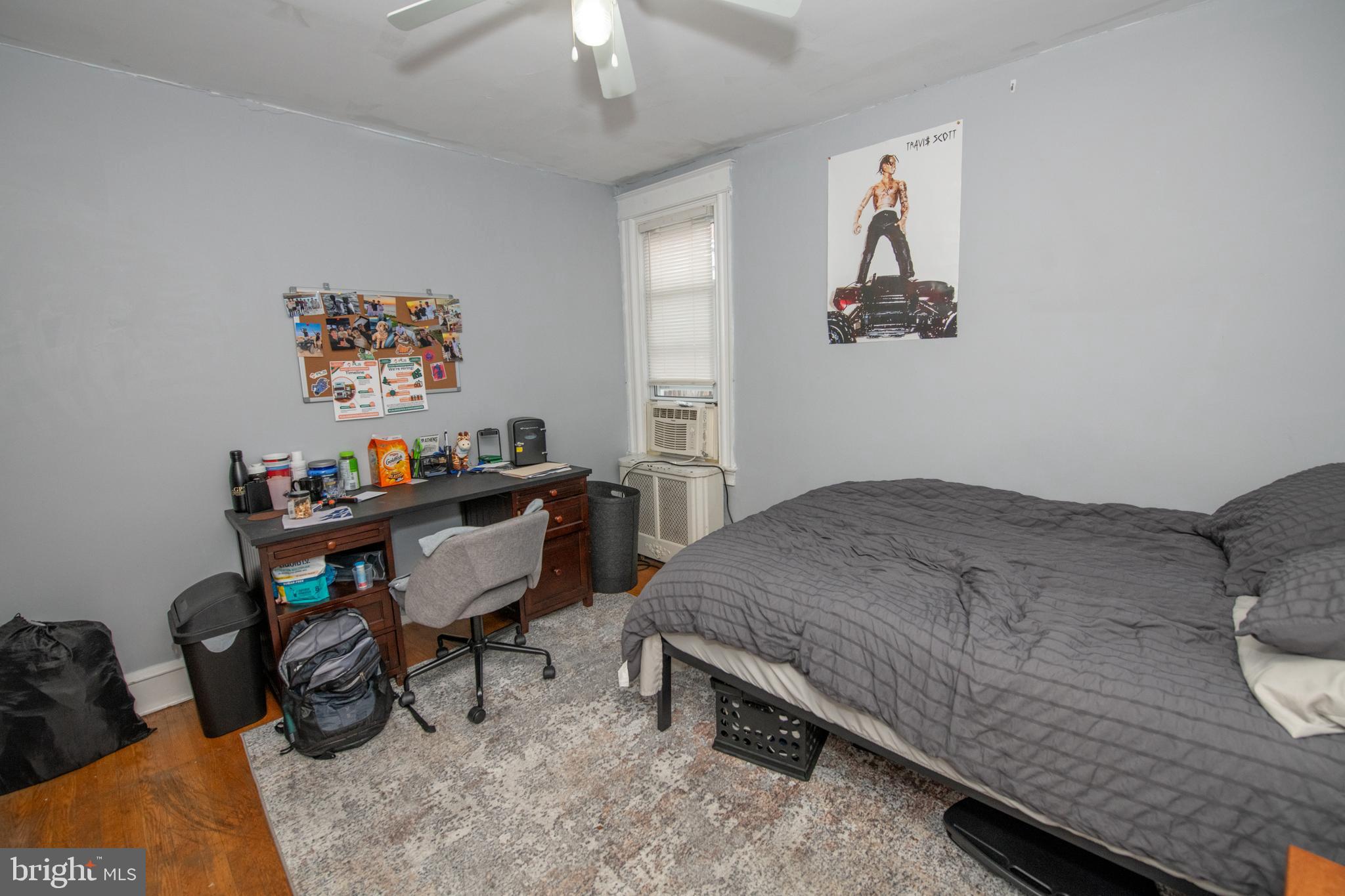5608 Woodbine Avenue Philadelphia, PA 19131 - Photo 36 of 44 a bedroom that has a bed and a chair in it
