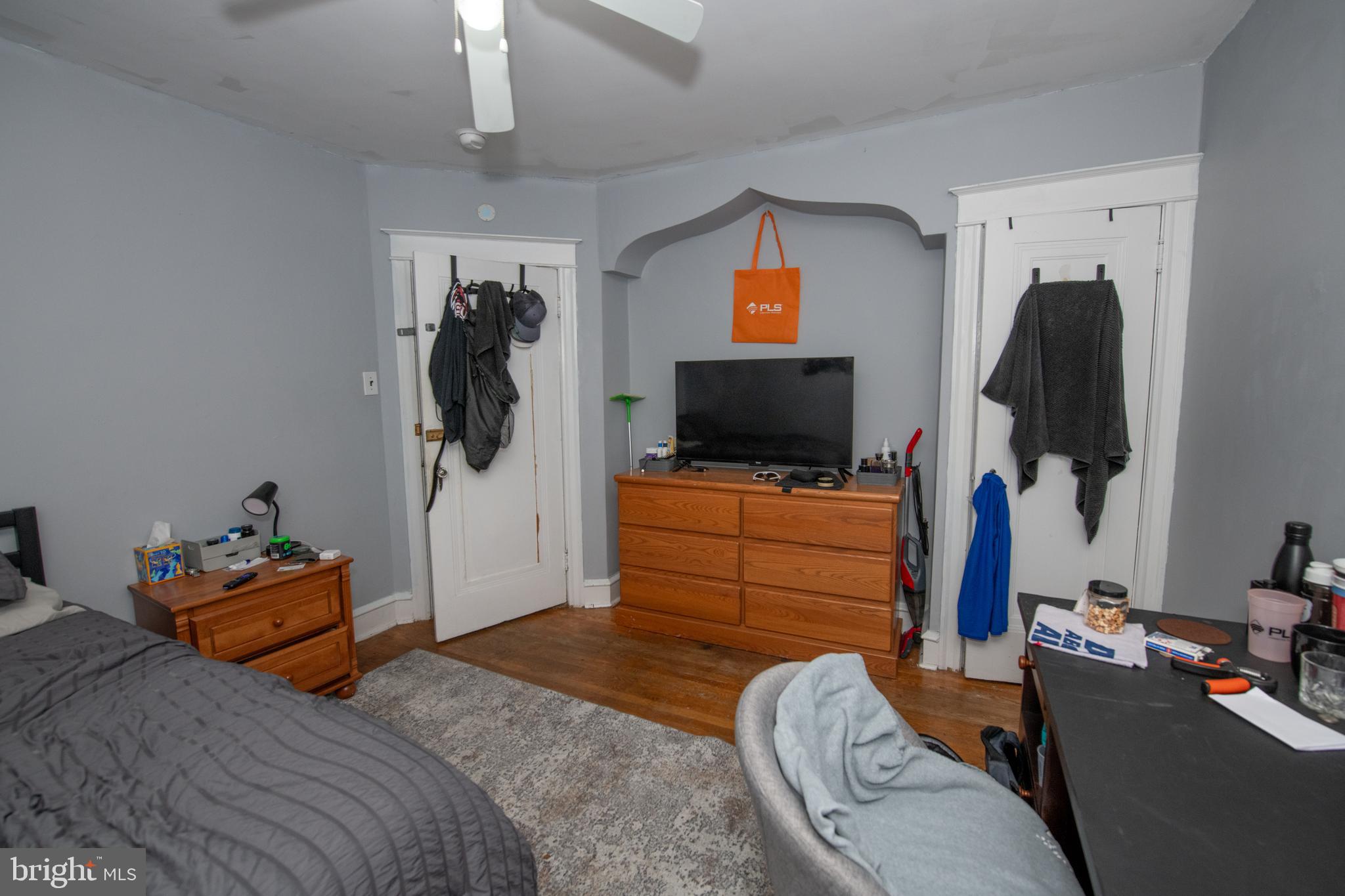 5608 Woodbine Avenue Philadelphia, PA 19131 - Photo 38 of 44 a bedroom with furniture and a flat screen tv