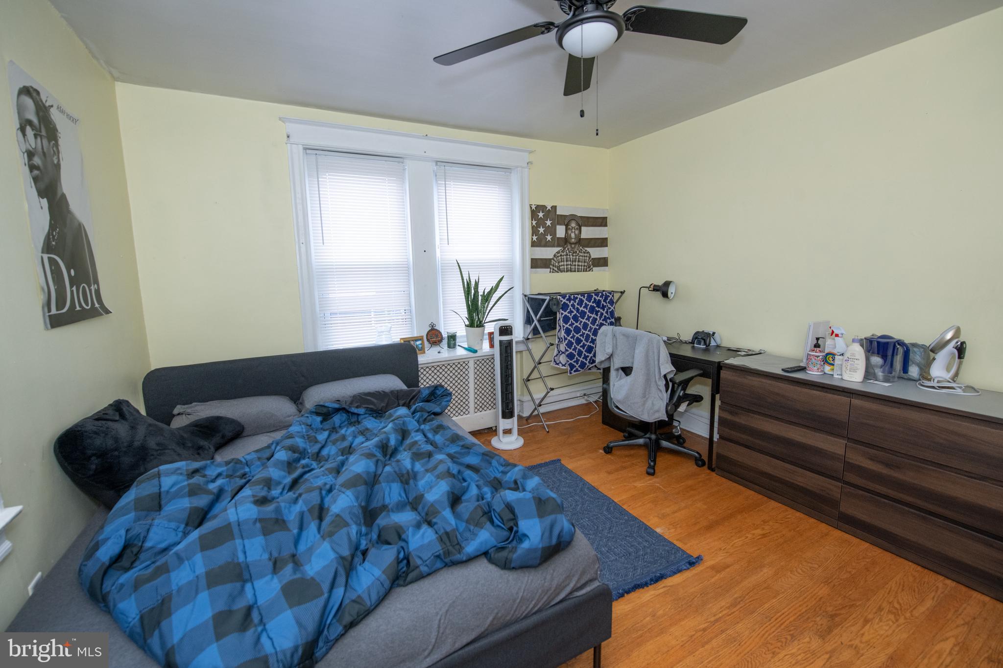 5608 Woodbine Avenue Philadelphia, PA 19131 - Photo 44 of 44 a bedroom with furniture and a window