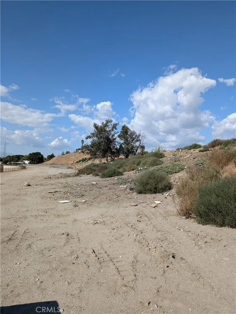 0 Hillcrest Colton, CA 92324 - Photo 2 of 2 a view of a dry yard with wooden fence