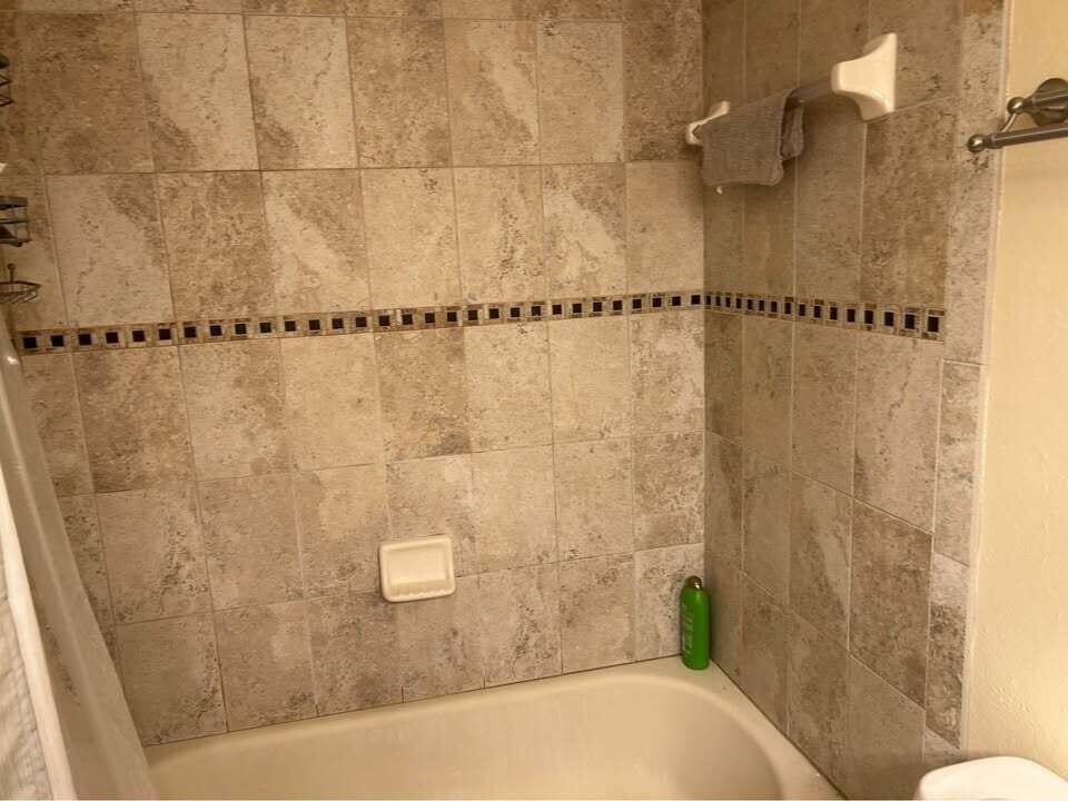 2243 Northwest 22nd Avenue, Unit 104 Stuart, FL 34994 - Photo 11 of 26 a bathroom with a shower