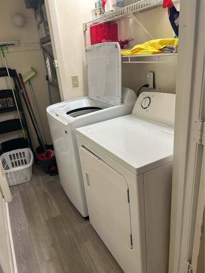 2243 Northwest 22nd Avenue, Unit 104 Stuart, FL 34994 - Photo 13 of 26 a utility room with dryer and washer