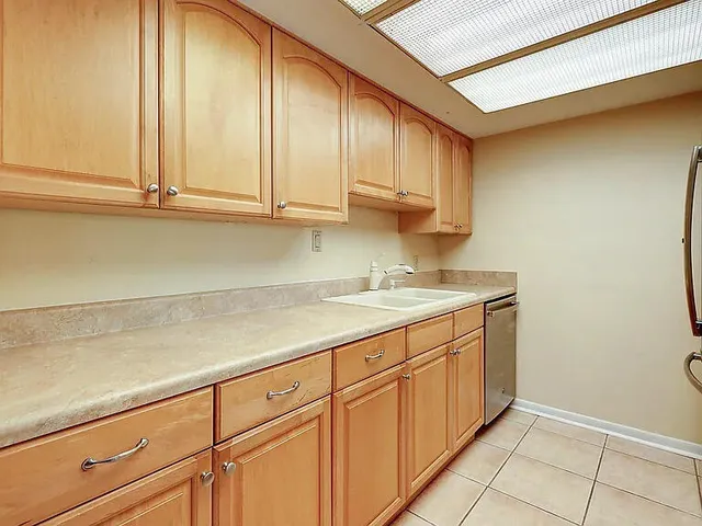 a view of cabinets with wooden floor