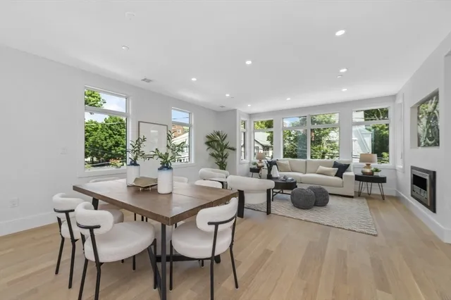 a view of a dining room with furniture window and outside view