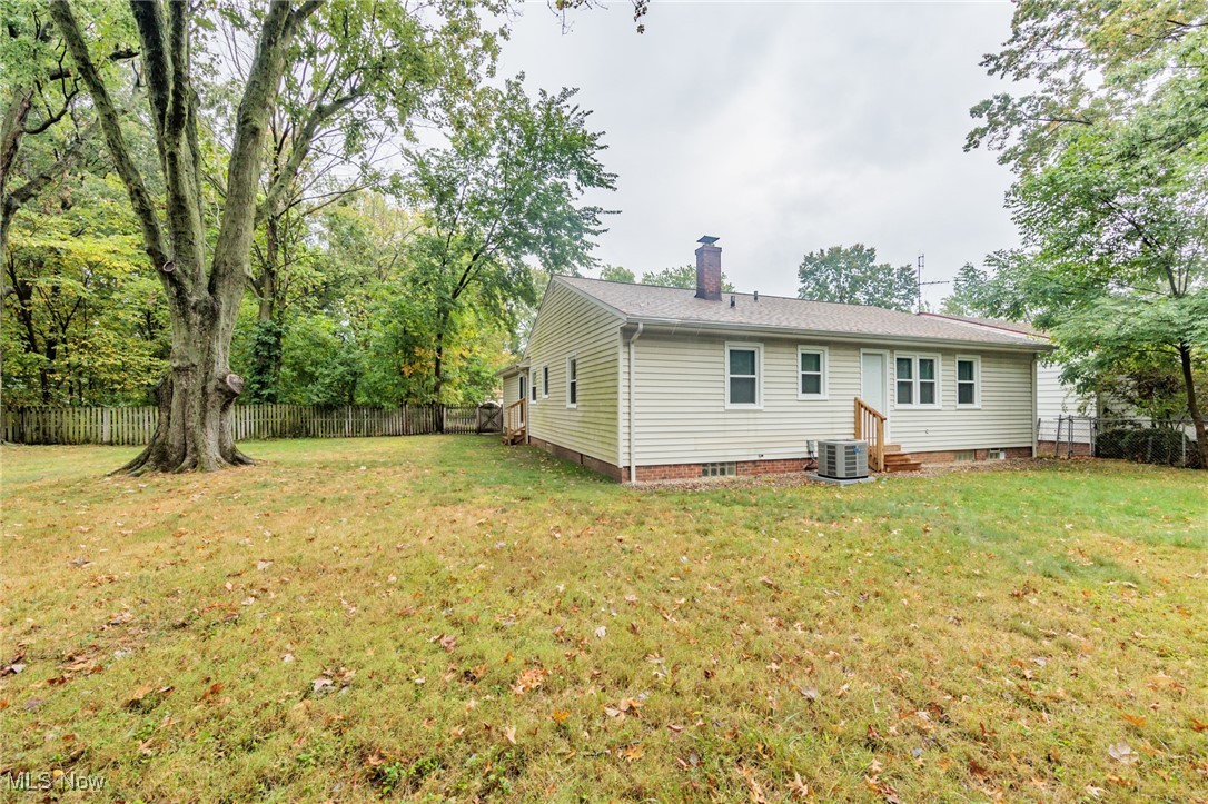 952 Murray Road South Euclid, OH 44121 - Photo 25 of 30 Back of property with cooling unit and a yard