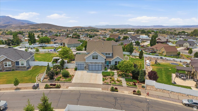 2038 East Ranch Road Eagle Mountain, UT 84005 - Photo 58 of 66 Modern Craftsman-style residence with a light blue and stone facade
