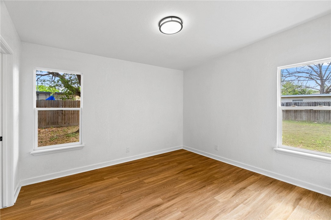 4018 Stirman Street Corpus Christi, TX 78411 - Photo 15 of 22 an empty room with a window