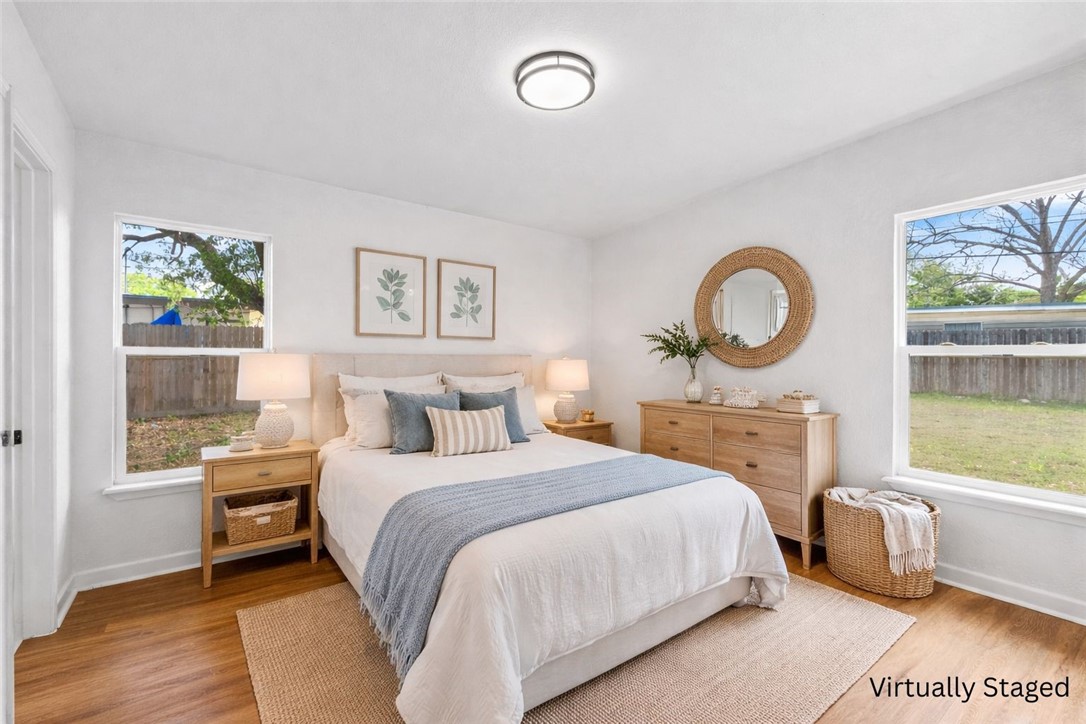 4018 Stirman Street Corpus Christi, TX 78411 - Photo 16 of 22 a bedroom with a bed and a window