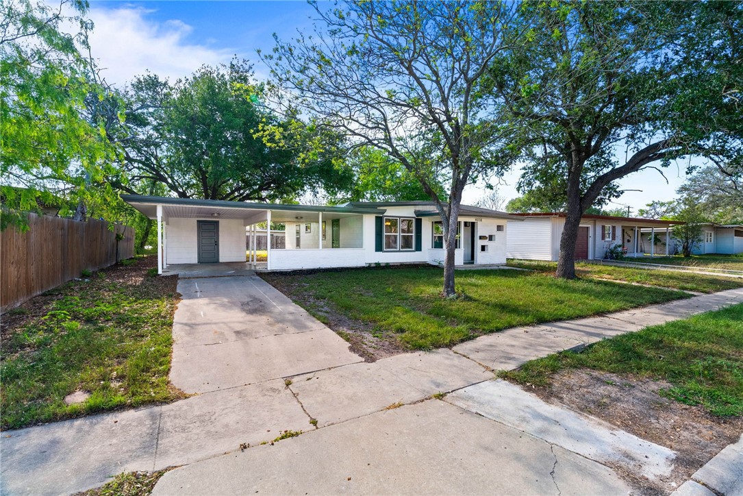 4018 Stirman Street Corpus Christi, TX 78411 - Photo 2 of 22 front view of a house and a yard