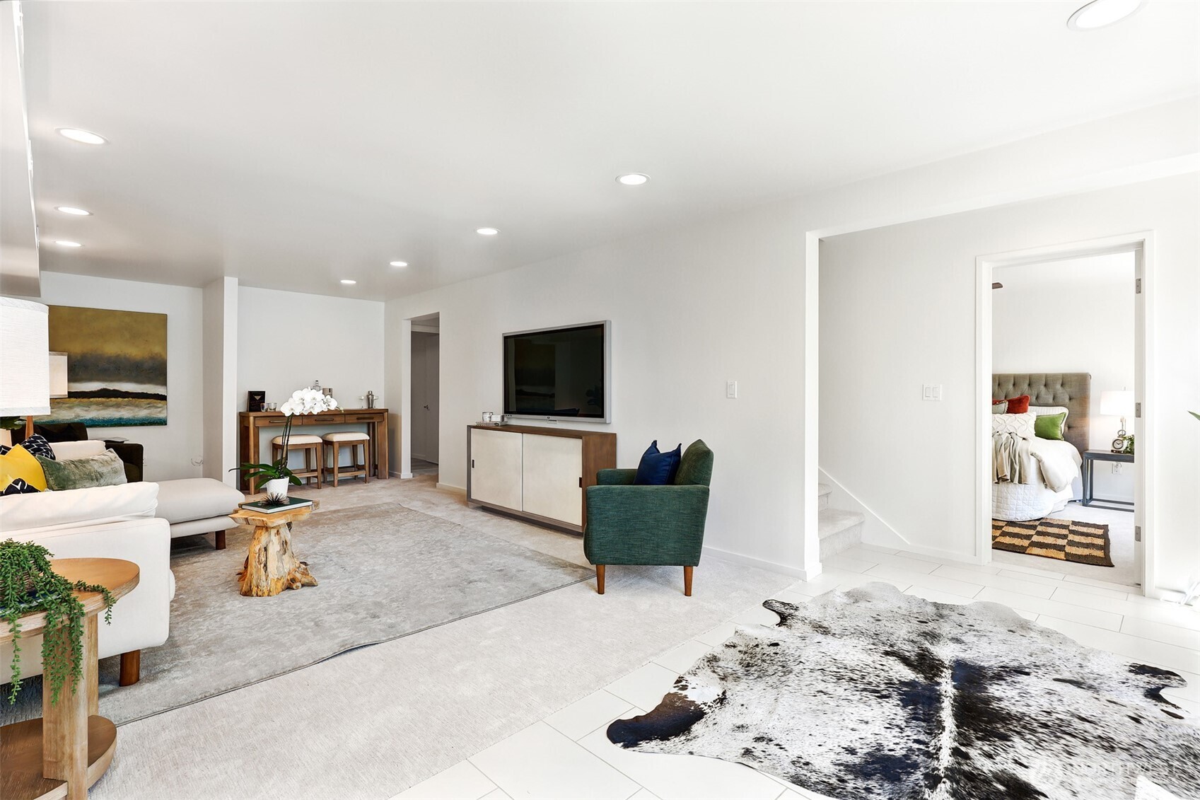 2547 Northeast 83rd Street Seattle, WA 98115 - Photo 29 of 38 a living room with furniture and a flat screen tv