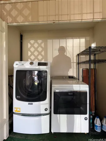 a utility room with washer and dryer