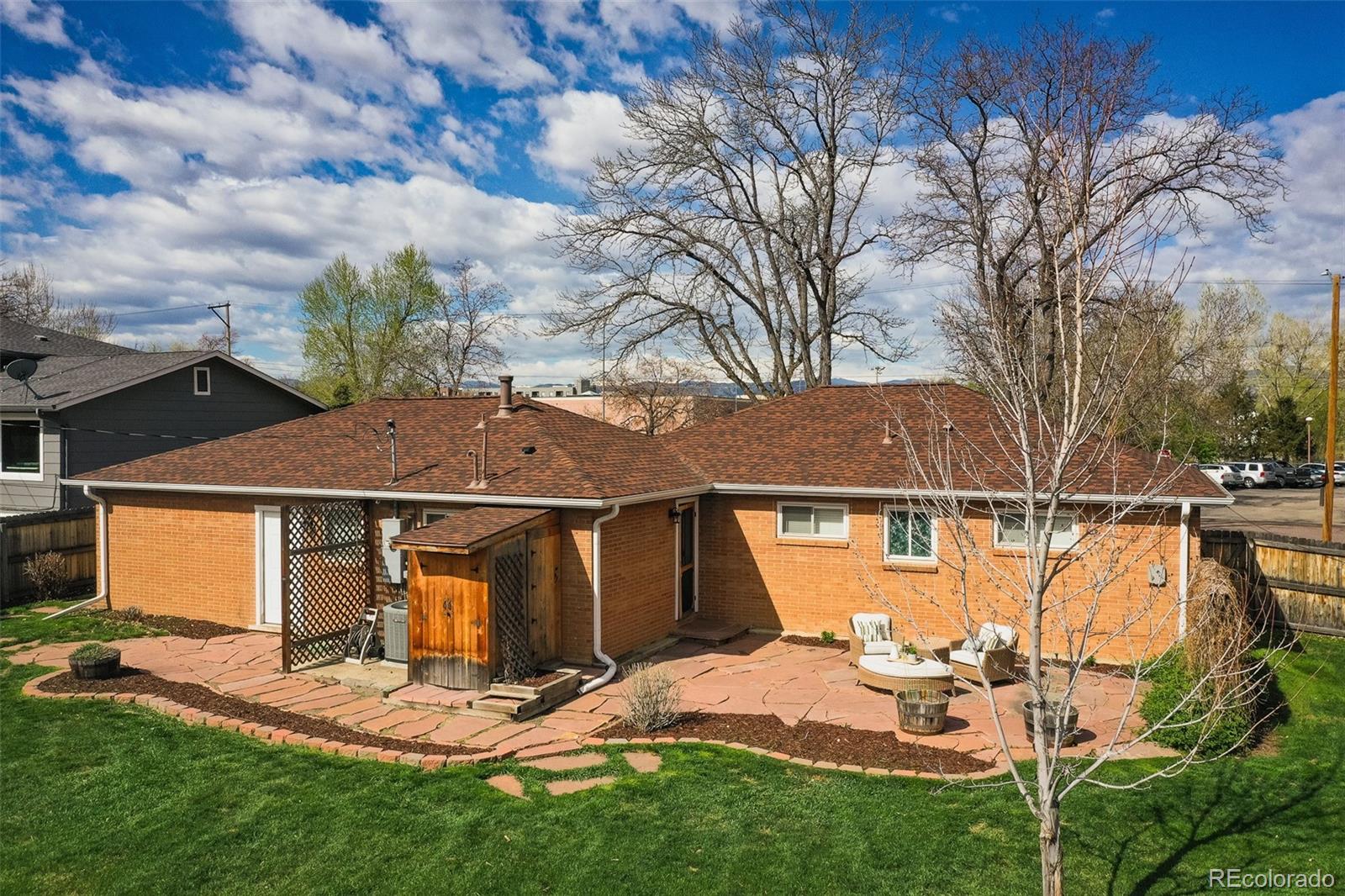 4000 Reed Street Wheat Ridge, CO 80033 - Photo 36 of 44 a view of a house with pool and sitting area