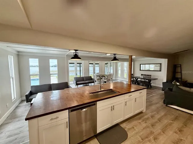 a kitchen with counter top space and sink
