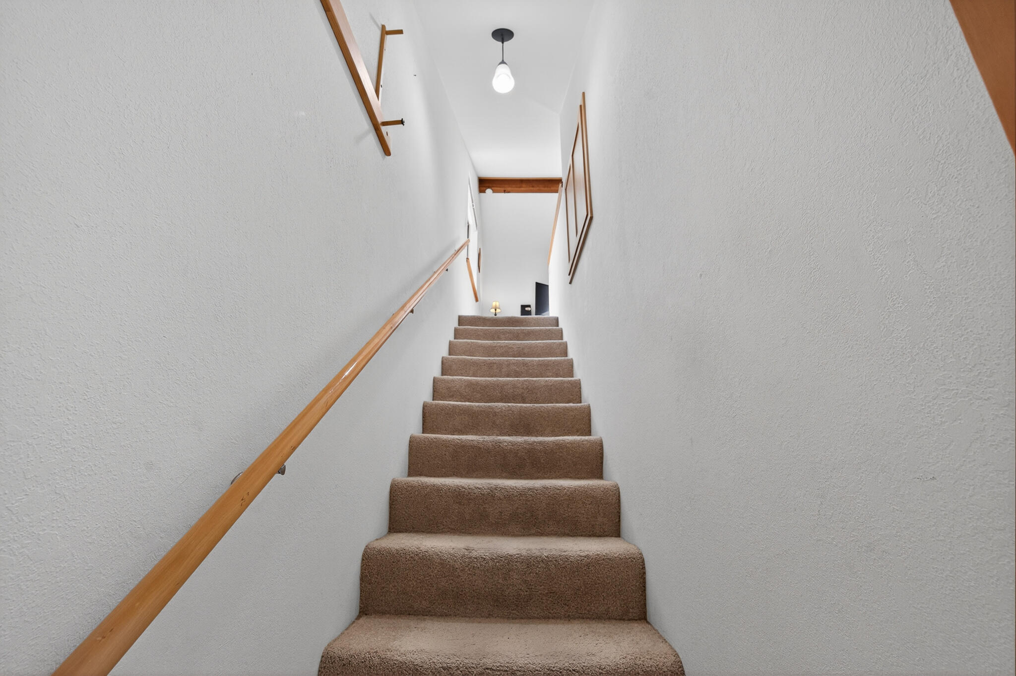 60866 Brosterhous Road Bend, OR 97702 - Photo 35 of 41 Up the stairs to the extra room over the garage