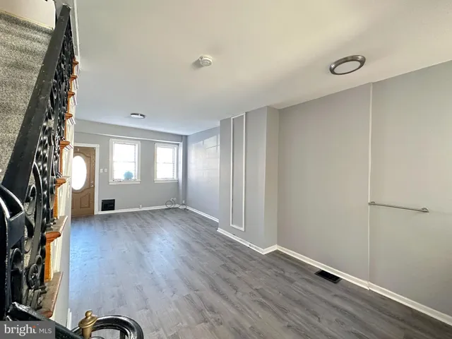 a view of a dining room with furniture and window