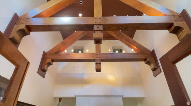 426 West Center Street Parowan, UT 84761 - Photo 37 of 107 Exposed wood ceiling beams with decorative corbels, recessed lighting, and a high vaulted ceiling