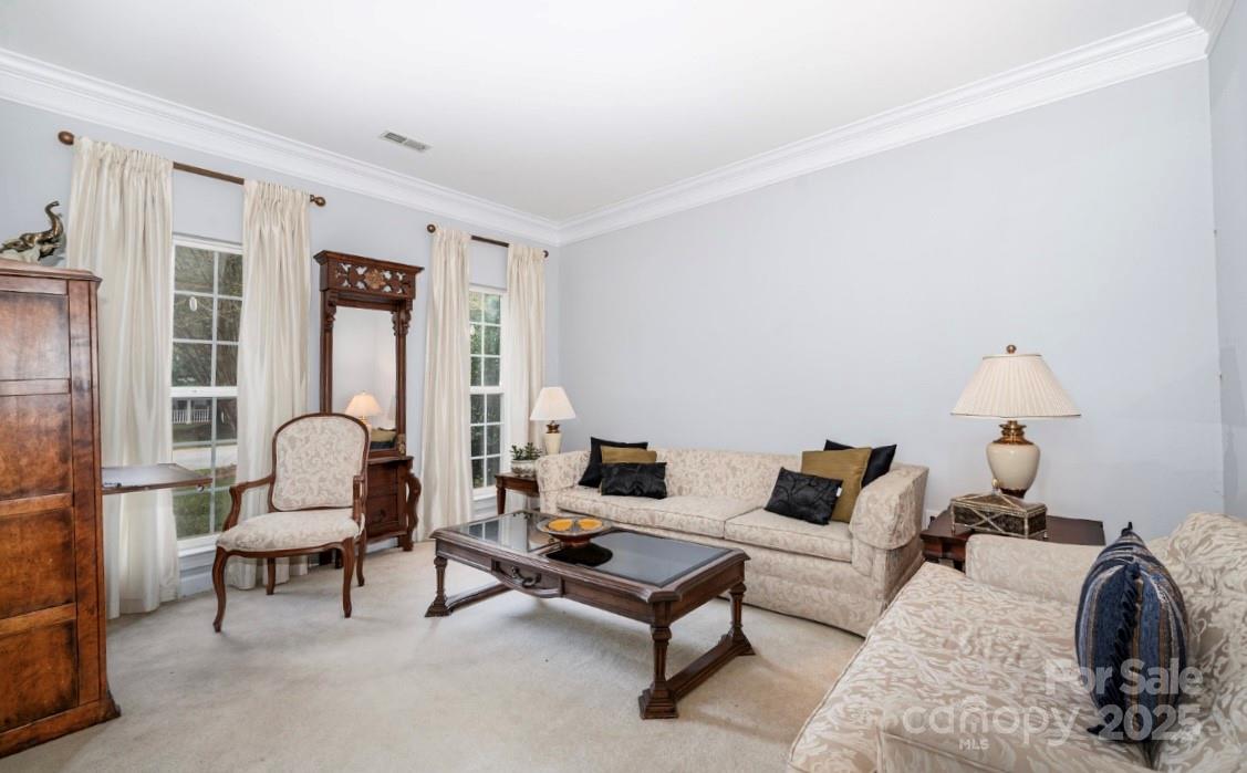 6930 Reedy Creek Road Charlotte, NC 28215 - Photo 10 of 28 a living room with furniture