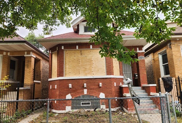 6716 South Bell Avenue Chicago, IL 60636 - Photo 1 of 10 a front view of house with yard