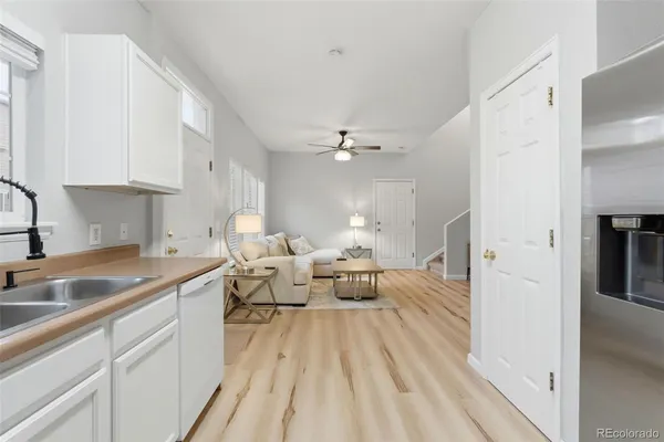 a very nice looking living room with a sink