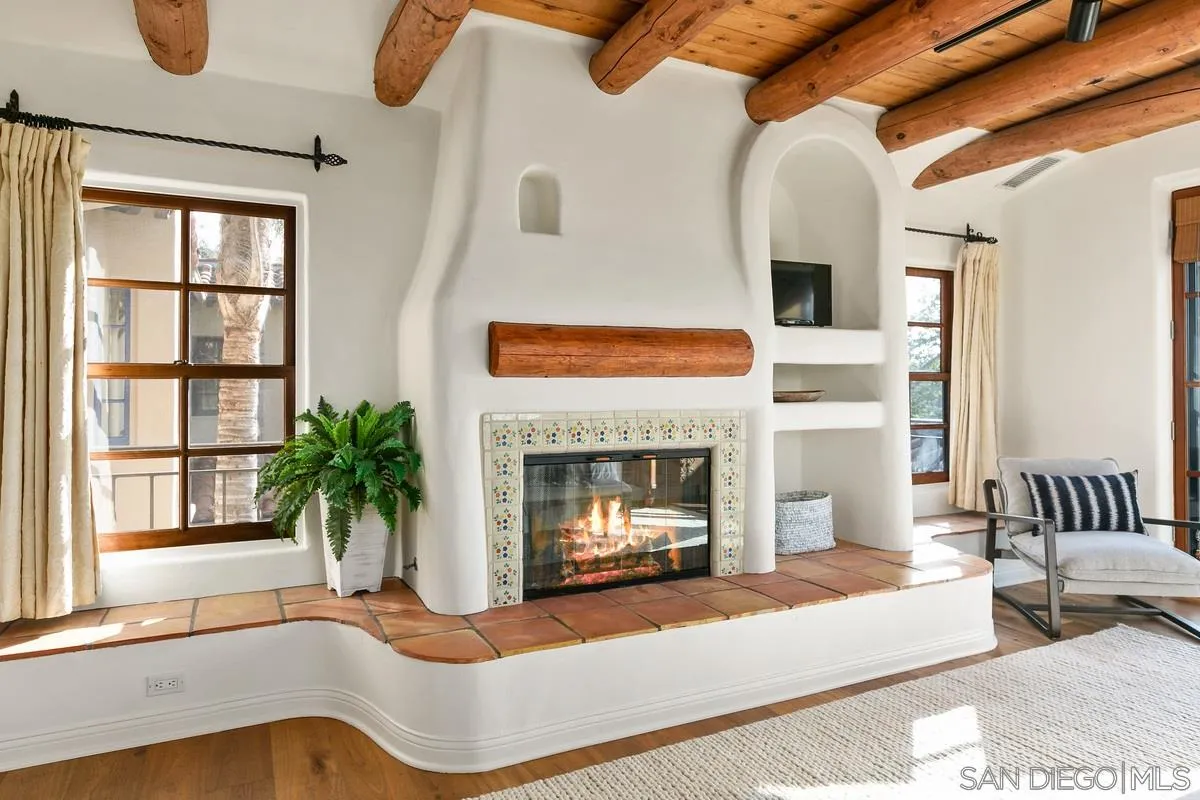 16309 Orchard Bend Road Poway, CA 92064 - Photo 24 of 66 a living room with furniture and a fireplace