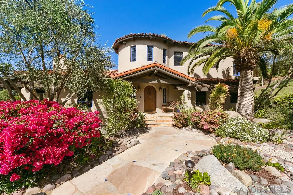 16309 Orchard Bend Road Poway, CA 92064 - Photo 31 of 66 a front view of a house with a yard