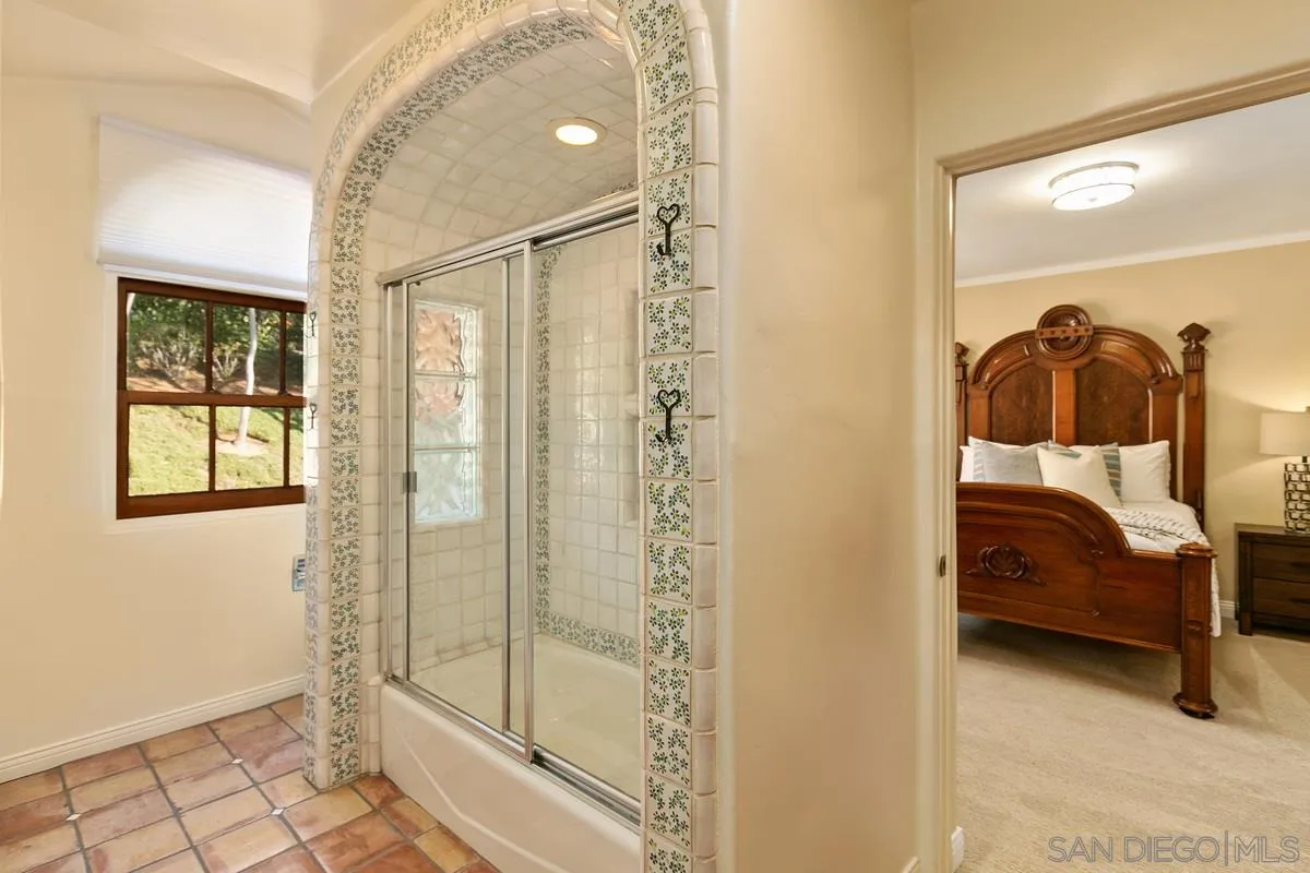 16309 Orchard Bend Road Poway, CA 92064 - Photo 44 of 66 a bedroom with a bed and a window