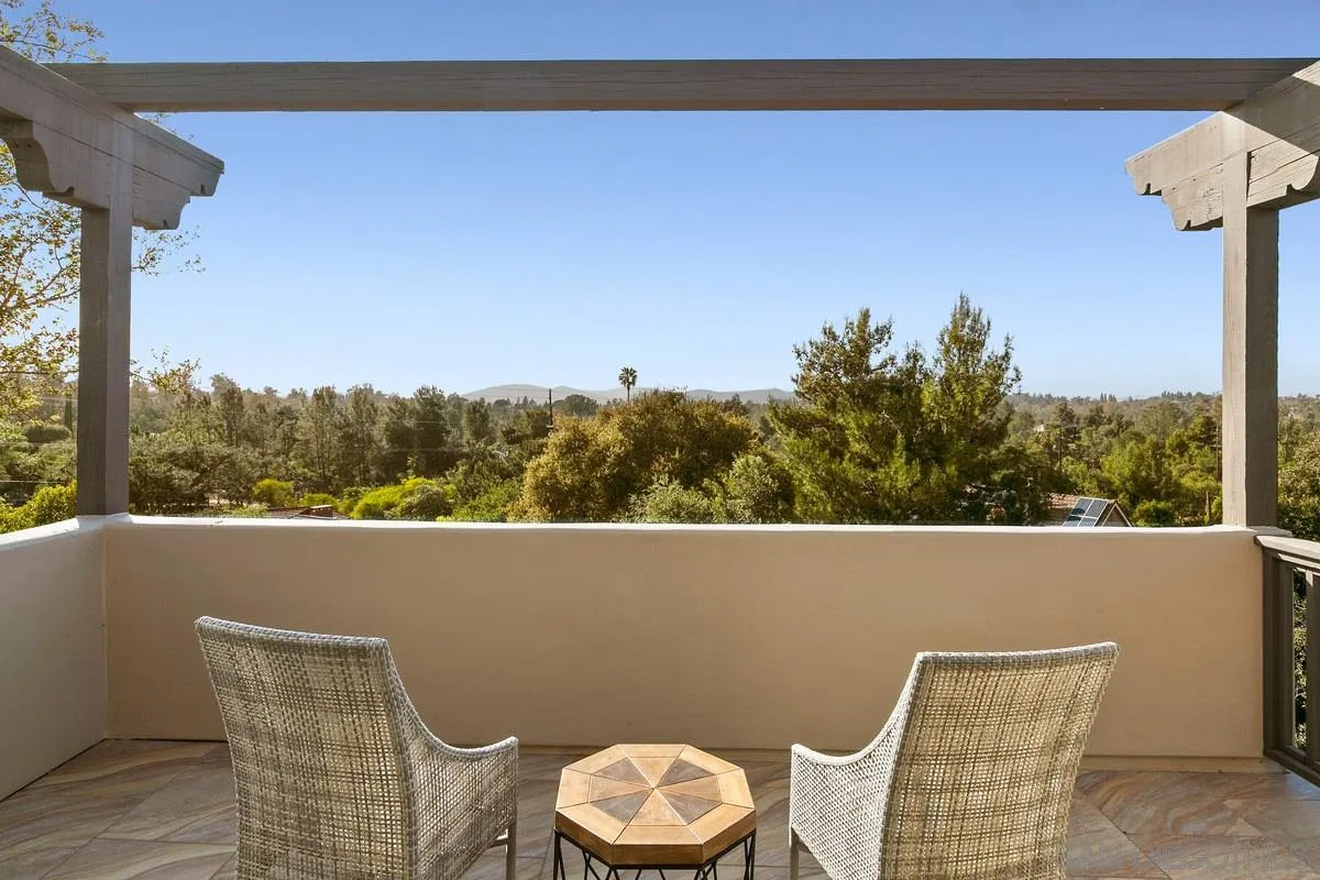16309 Orchard Bend Road Poway, CA 92064 - Photo 46 of 66 a view of a chair and fire pit in a backyard