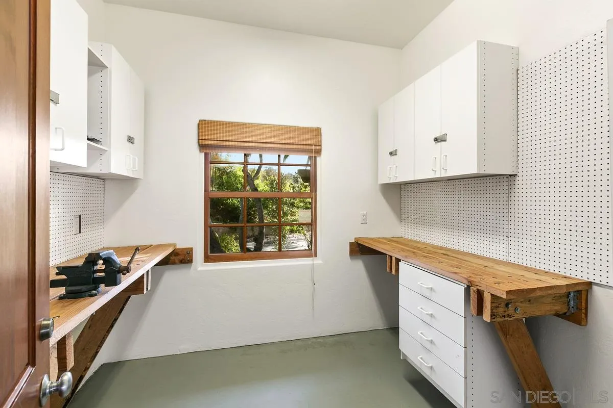 16309 Orchard Bend Road Poway, CA 92064 - Photo 50 of 66 a kitchen with granite countertop a stove and a sink