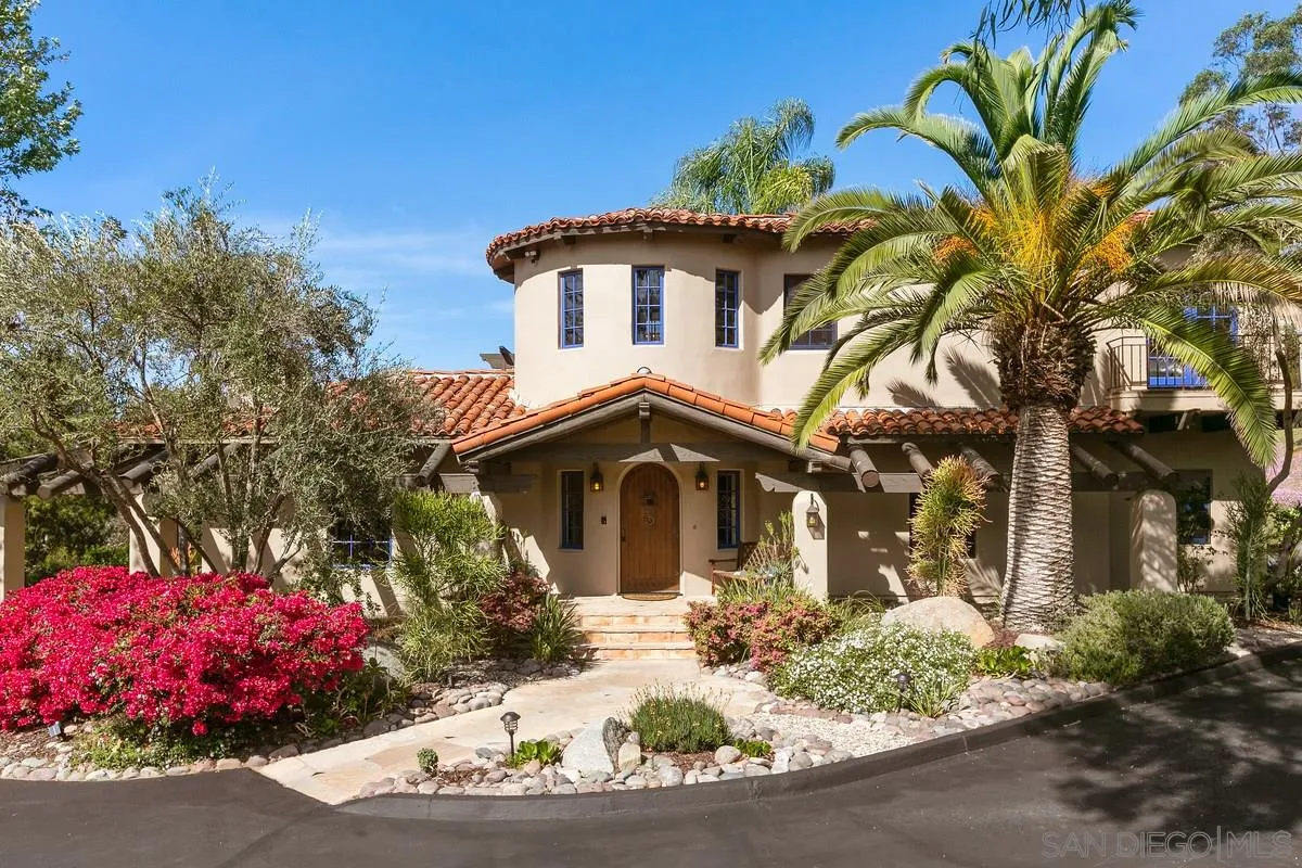 16309 Orchard Bend Road Poway, CA 92064 - Photo 60 of 66 a front view of a house with a yard