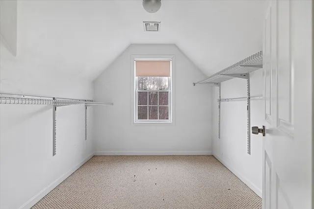 a view of a hallway with a white walls